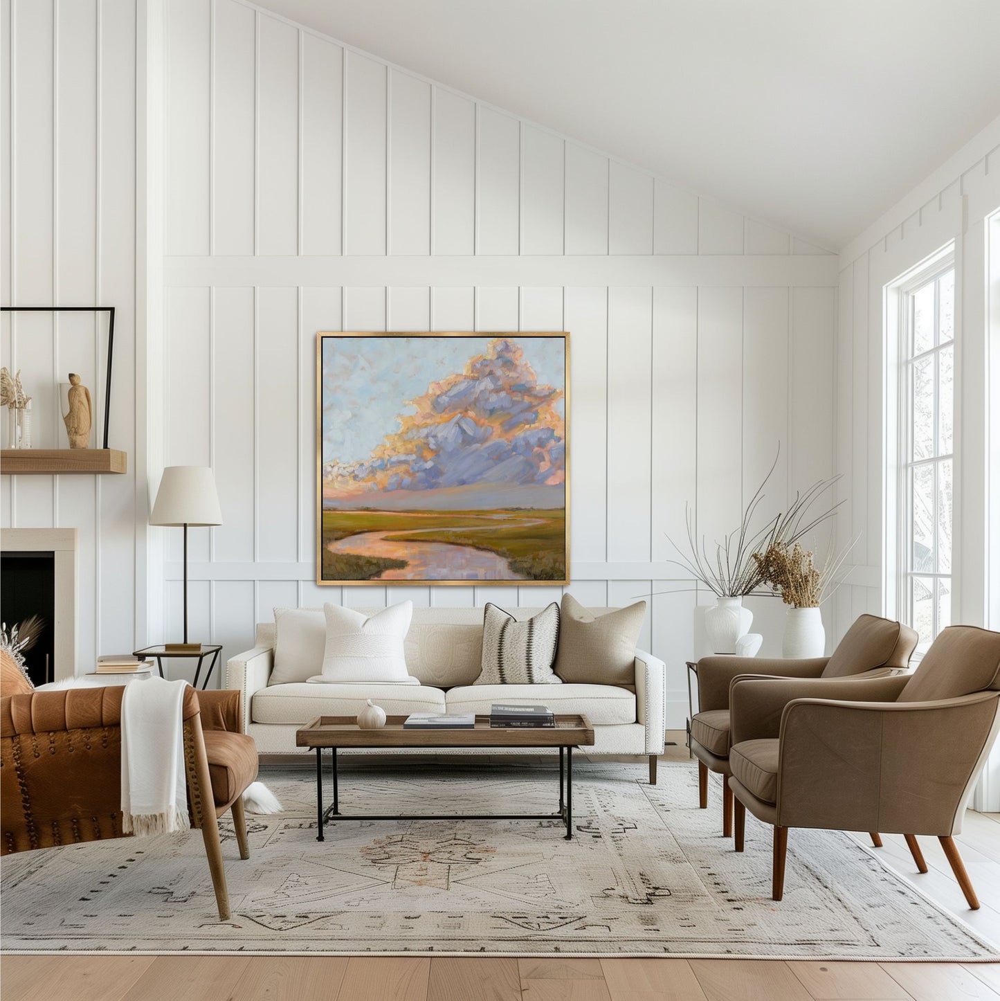 Hand-embellished sunset marsh art with olive green grasses and impasto texture, shown in a designer gold frame within a luxury transitional-style family room.