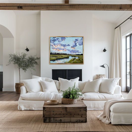 Hand-embellished square marsh painting with periwinkle and pale blue tones, styled as a focal point in a sophisticated coastal interior with a designer gold frame.