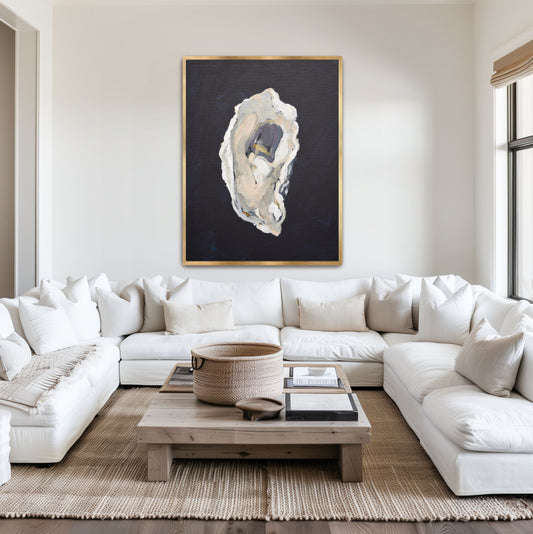 Lowcountry maritime art 'The Provider' styled in a gold frame within a sophisticated Savannah residence, showcasing the rugged, calcified texture of a classic South Carolina oyster shell