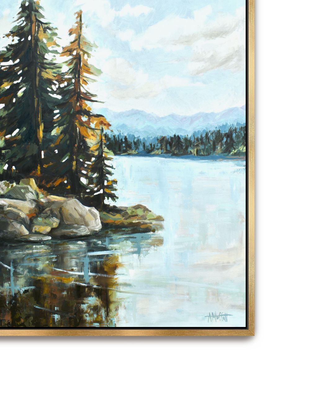 Framed landscape painting of a calm lake with tall evergreen trees, rocks, distant mountains, and a pale sky, shown with a thin gold frame against a white background.